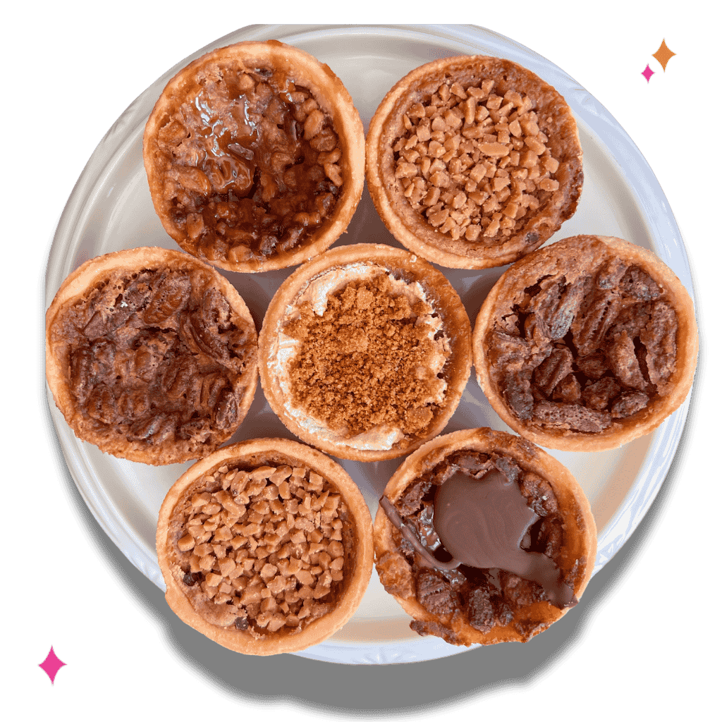 plate of assorted butter tarts from carla's cookie box.
